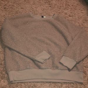 fuzzy light pink sweater!